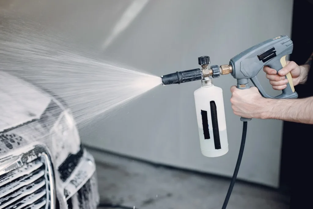 Pressure washer gun attachment